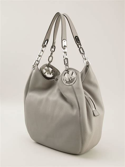 michael kors bag grey with silver front|grey michael kors shoulder bag.